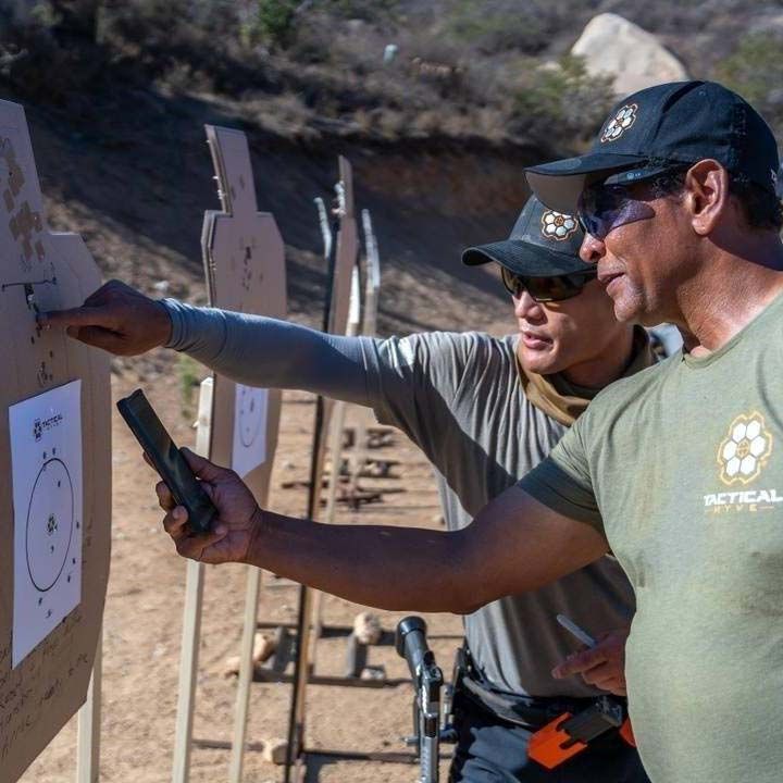 Tactical Hyve instructors evaluating targets on the range